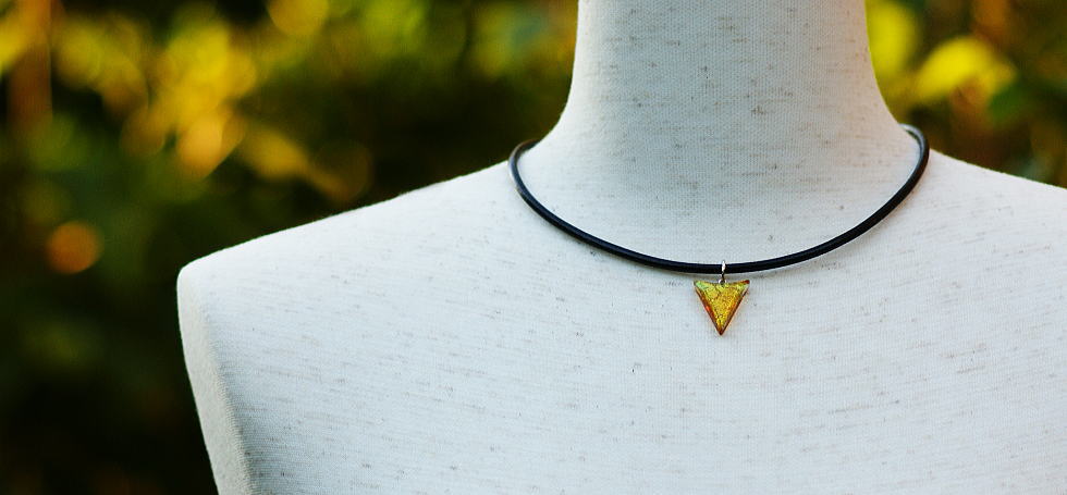 Dichroic triangle emblem